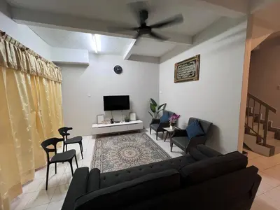 a living room with a couch and chairs and a tv at Teratak Segar Bayu - Musslim Only Tanjong Malim Perak in TanjongMalim