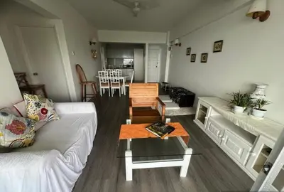 a living room with a couch and a table at Misty at Fraser's Hill in Bukit Fraser