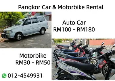 a row of motorcycles parked in a parking lot at Pangkor Shu Yuan \u90a6\u54af\u5c9b\u5885\u82d1\u6d77\u6ee9\u522b\u5885 in Pangkor