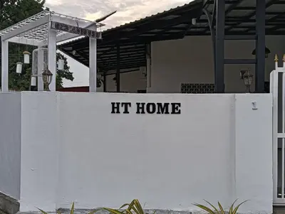 a white wall with the words hit home on it at HT Home in Ipoh