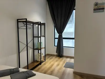 a room with a black curtain and a window at Serene Terrace House 2-12pax &Sunrise View in Brinchang