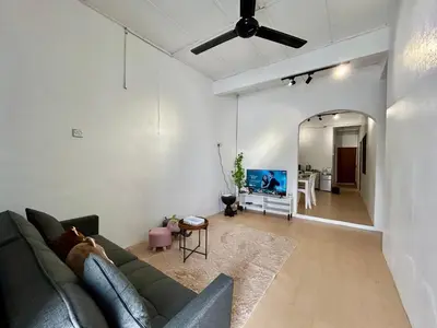 a living room with a couch and a mirror at Home10perwira#6pax#netflix#simpangampat#neariconicpoint in Simpang Ampat