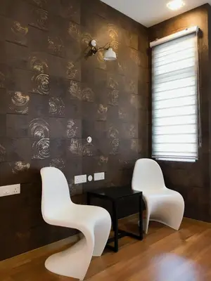 two white chairs and a table in a room at Shamrock Boutique Villa - Stay for 12 person in Batu Ferringhi