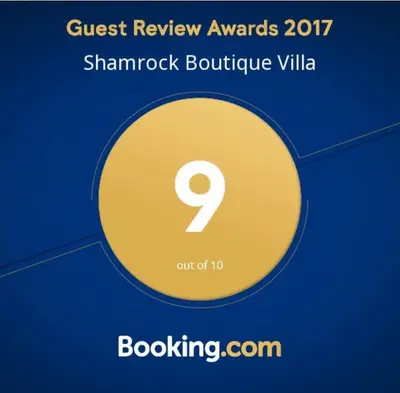 a yellow circle with the number on it at Shamrock Boutique Villa - Stay for 12 person in Batu Ferringhi