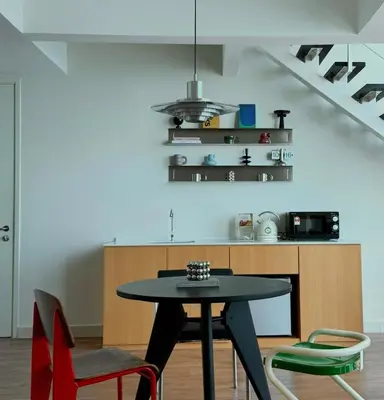 a dining room with a table and chairs at Haus in George Town