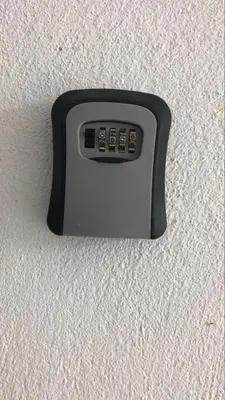 a remote control on the side of a wall at Skyn 2 smartstay in Ipoh