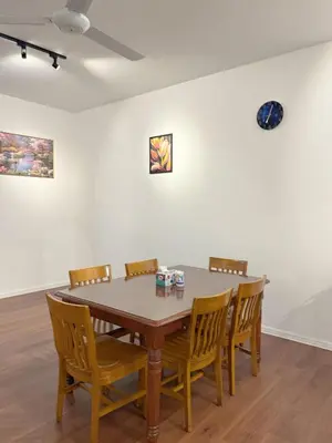 a dining room table and chairs in a room at 180View of Keafarm 7-9Pax CoolSummer at Palas Horizon in Tanah Rata