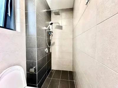 a bathroom with a shower and a toilet at Home Away From Home in Penang in Jelutong