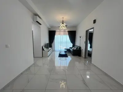 a living room with a couch and a chandelier at Di Aran Residence Penang in Simpang Ampat