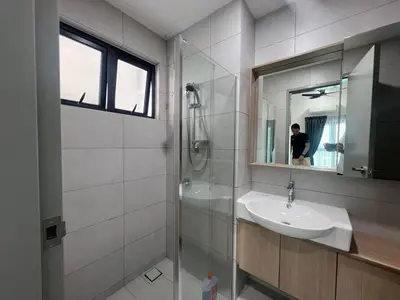 a bathroom with a sink and a shower and a mirror at Di Aran Residence Penang in Simpang Ampat