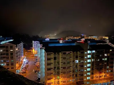 a view of a city at night with buildings at Adik Aisyah goldblack homestay cameron highlands in Tanah Rata
