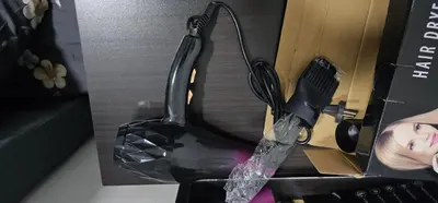 a hair dryer in a box on a desk at Suria Aman Homestay Semi-D 5 Rooms 5 Bathrooms in Taiping