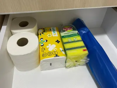 a drawer with toilet paper and a roll of toilet paper at CozyNest Homestay The venus Sitiawan Sing & Play in Seri Manjung
