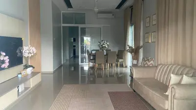 a living room with a couch and a table at D Cahaya Homestay in Tapah