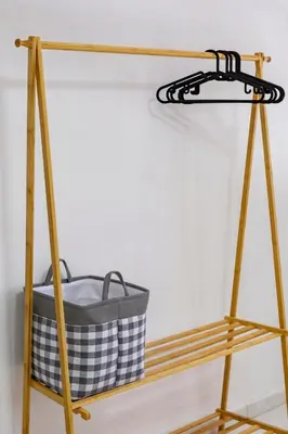 a wooden shelf with a basket on it at Riverview Staycation 5mins to Sunway Carnival for 9 pax in Perai