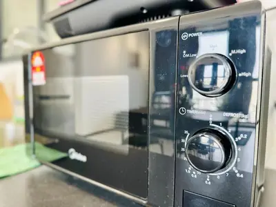 a close up of a toaster oven at 3BR urban suites 8-10pax luxury family stay netflix in Jelutong