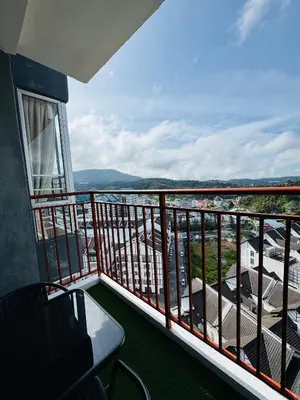 a balcony with a view of a city at Daddy Homes3 Emerald Centrum Brinchang Cameron Highlands sunset view in Brinchang