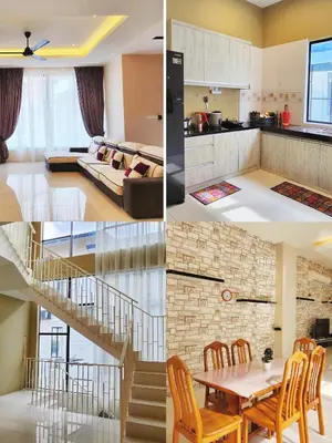 a kitchen and a living room with a staircase at Botani Nadya 5B4B by verve 19 pax in Ipoh