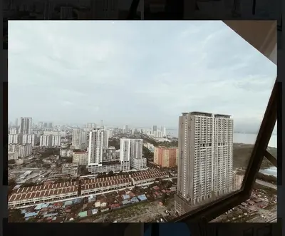 a view of a city from a window at relax family stay 3BR 10pax urban in Jelutong