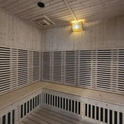 a room with wooden shutters on the wall at ThemeParkview-Sunway Onsen-2br2b in Ipoh