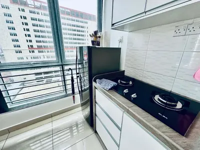a kitchen with a stove and a window at 8pax 2-Bedroom l Seaview l Georgetown l Gleneagles l Mansion One in George Town