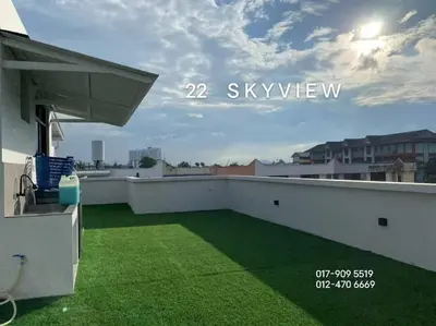 a balcony with green grass on a roof at 22 Skyview in Bukit Mertajam