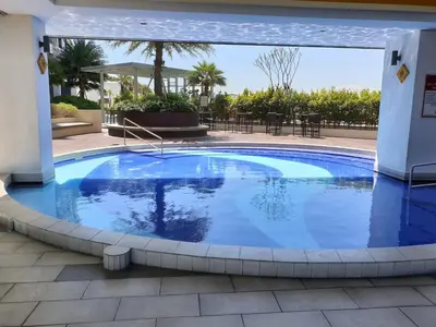 a swimming pool in a resort with a large pool at Ipoh town The Majestic Rumi 3R2B 8 paxs in Ipoh