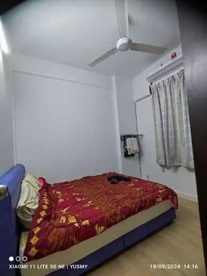 a bedroom with a bed and a ceiling fan at 3 Bedroom Apartment YuCasa Sg Nibong Penang in Bayan Lepas