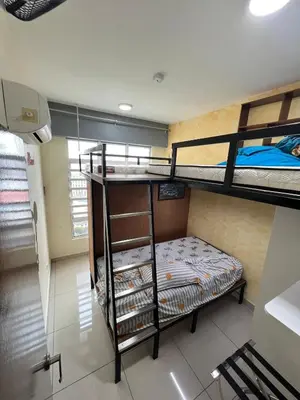 a room with two bunk beds and a bed at The Majestic Ipoh 3R2B SLY Home Twin City view unit in Ipoh