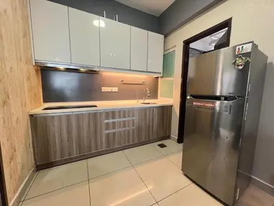 a kitchen with a stainless steel refrigerator and white cabinets at The Majestic Ipoh 3R2B SLY Home Twin City view unit in Ipoh