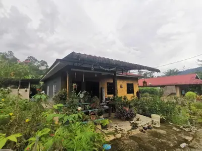 a house with a garden in front of it at Lata Jawa in Benta