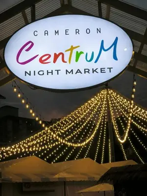 a sign for a convention center at a night market at Astana D'Cameron Homestay in Brinchang