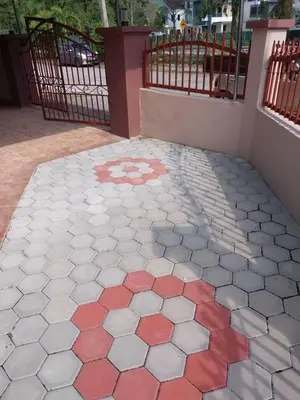 a tile floor with a design on the side of a building at Comfy21 Homestay Ipoh in Ipoh