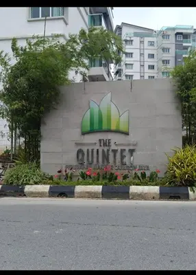 a sign on the side of a building at Ummu's homestay in Tanah Rata