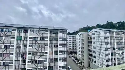 an aerial view of apartment buildings in a city at Wan AyuRa Homestay in Tanah Rata