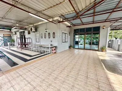 a large room with a tile floor in a building at Homestay Mohd Lee in Sungai Petani
