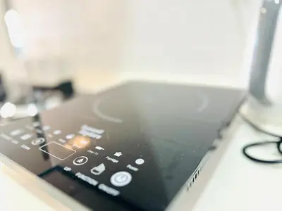 a close up of a laptop screen on a desk at Fresh, Modern Georgetown Suite with Sky Pool Views in George Town