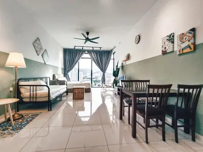 a living room with a table and a couch at Haven Luxury 2BR Suite with Stunning Views in George Town