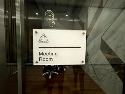 a sign in a glass door of a meeting room at Classic House in Georgetown 3BR 10pax in George Town