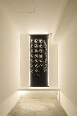 a room with a black grate on the wall at Loft 82 in Bukit Mertajam