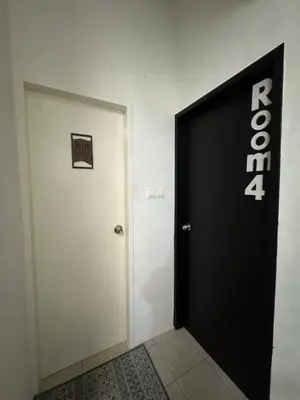 a black door with the words robertoamine on it at Lapang Tuju Private Pool Homestay in Sungai Petani