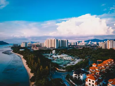 an aerial view of a city with a river and buildings at sea city cozy familystay 3br 10 pax in George Town