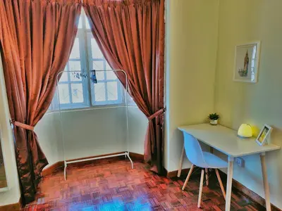 a small room with a table and a window at Queensbay Mall, Up to 6 Pax, 3 Bedrooms, 2 Bathrooms, 1 Car Park by Star Home in Bayan Lepas