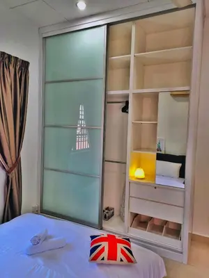 a bedroom with a large glass window with a bed at Semi-Detached, Up to 24 Pax, 3200sqft, 4 Bedrooms, 3 Bathrooms, 4 Car Parks by Star Home in Gelugor