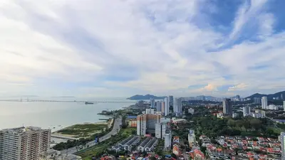 an aerial view of a city with a bridge at Near Georgetown with Beautiful city view 2 room fit 4 to 7 pax in Jelutong