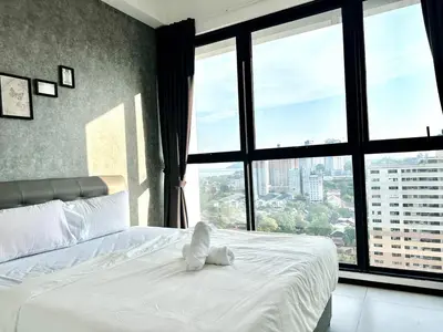 a bedroom with a white bed with a large window at Royal Luxury apartment in Georgetown 3BR 10PAX in George Town