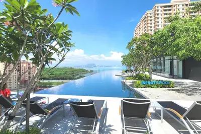 a view of a river from a hotel balcony at Rooftop Penang View & infinity pool suite apartment 3br 10 pax in George Town
