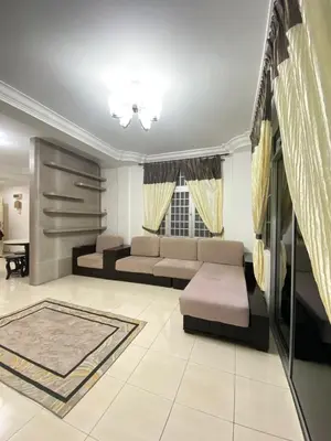 a living room with a couch and a table at Wanie CH Homestay 1 Brinchang Cameron Highlands in Brinchang