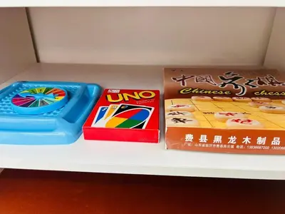two play food and a box on a shelf at Ipoh Garden 5 Homestay in Ipoh