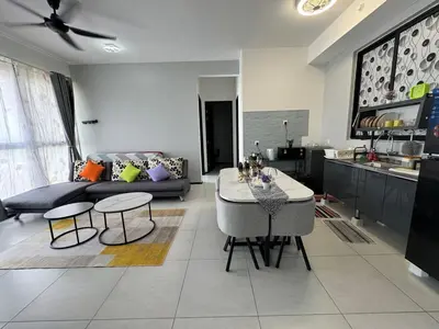 a living room with a couch and a table at Urban Rooftop veiw PENANG 3br 10 pax in Jelutong